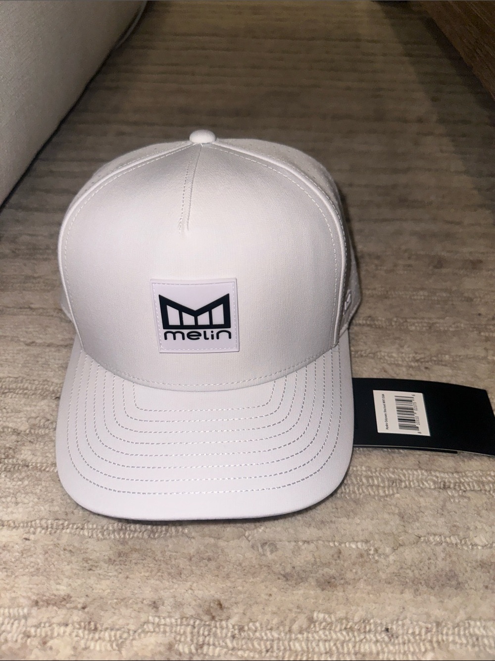 Melin White Logo Stacked Odyssey Snapback Hat